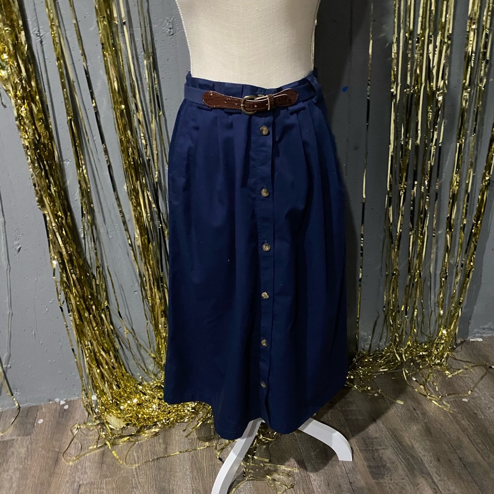 Navy blue pleated skirt with pockets and belt